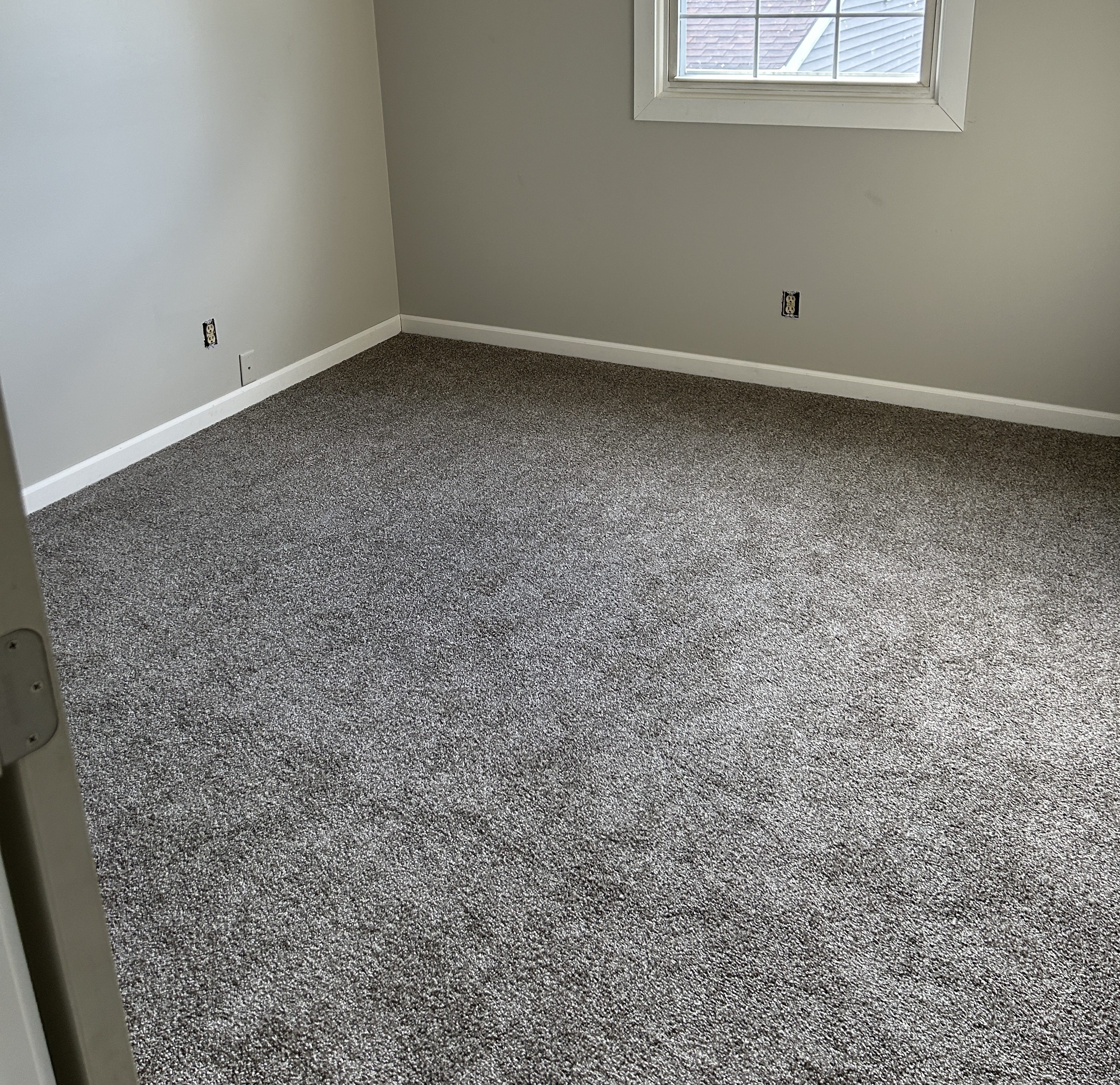 Professional carpet installation project completed by Flores Builds in Omaha, NE